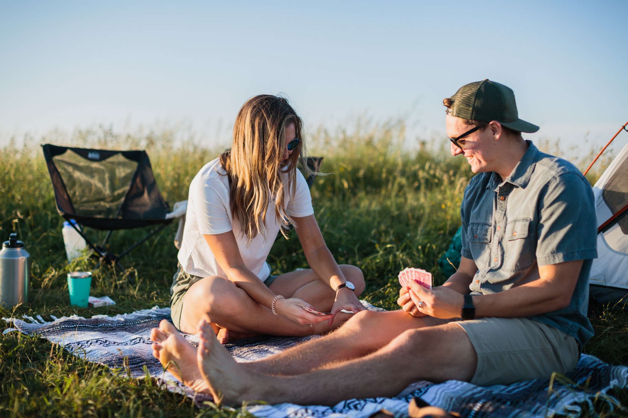 date night at max patch, girl with crossed legs and guy with stretched legs on blanket for date night on max patch, Nashville engagement, couples mountain, mountain engagement, couples camping, dog photography, Knoxville, couples hiking, camping with dog, North Carolina hiking, summer engagement photos, Tennessee Photography, Tennessee Photographer, Tennessee Photos, Tennessee Engagement Photography, Tennessee Engagement Photos, Tennessee Engagement Photographer, Tennessee Portrait Photographer, Nashville Engagement Photographer, Nashville Engagement Photos, Knoxville Engagement, Nashville Lifestyle Photographer, Nashville Lifestyle Photography, Nashville Lifestyle Photos, Creative Portraits