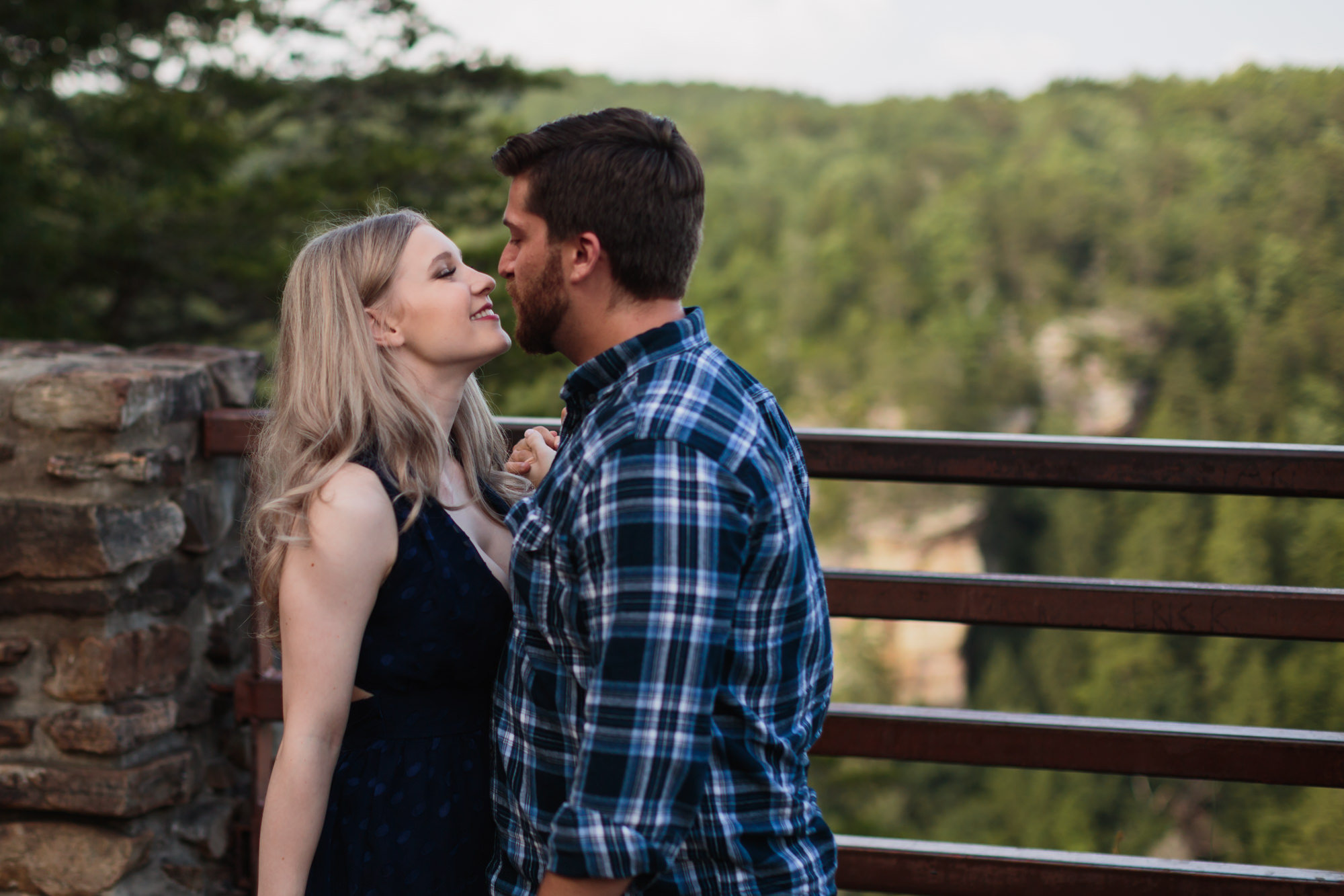close faces almost kissing at fall creek falls tennessee
