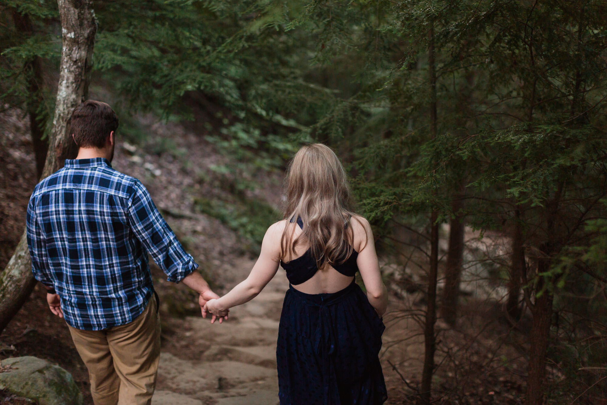 holding hands outside hiking at fall creek falls