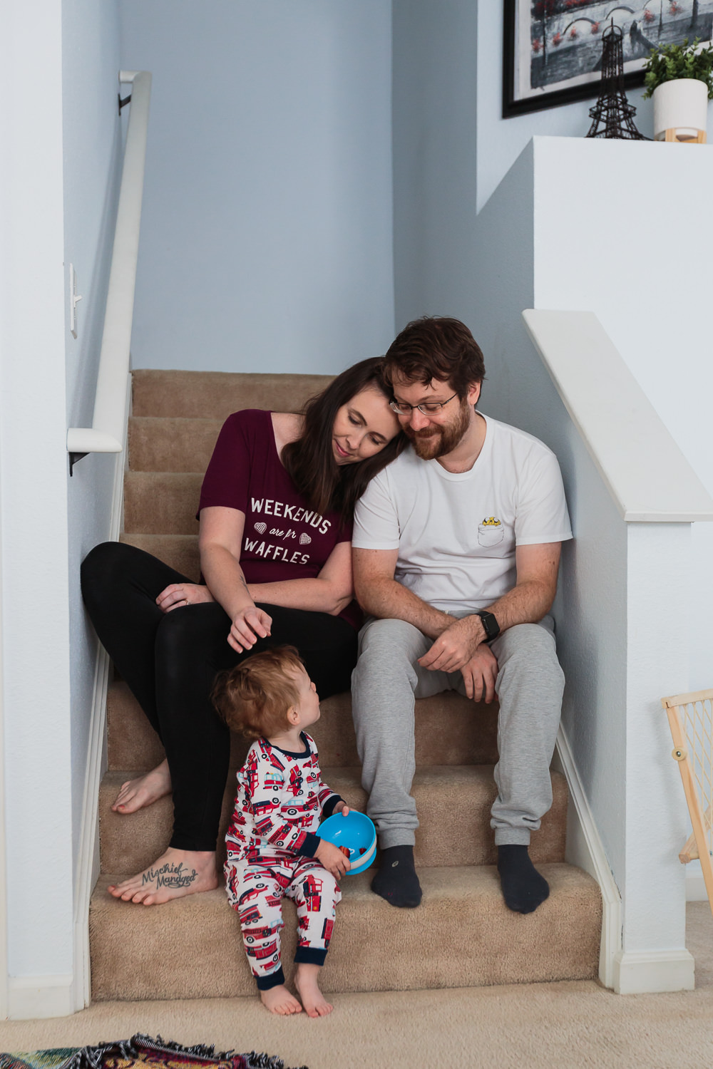 family sitting on stairs